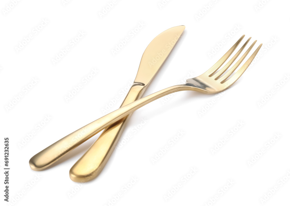 Shiny golden fork and knife isolated on white. Luxury cutlery Shiny golden fork and knife isolated on white. Luxury cutlery