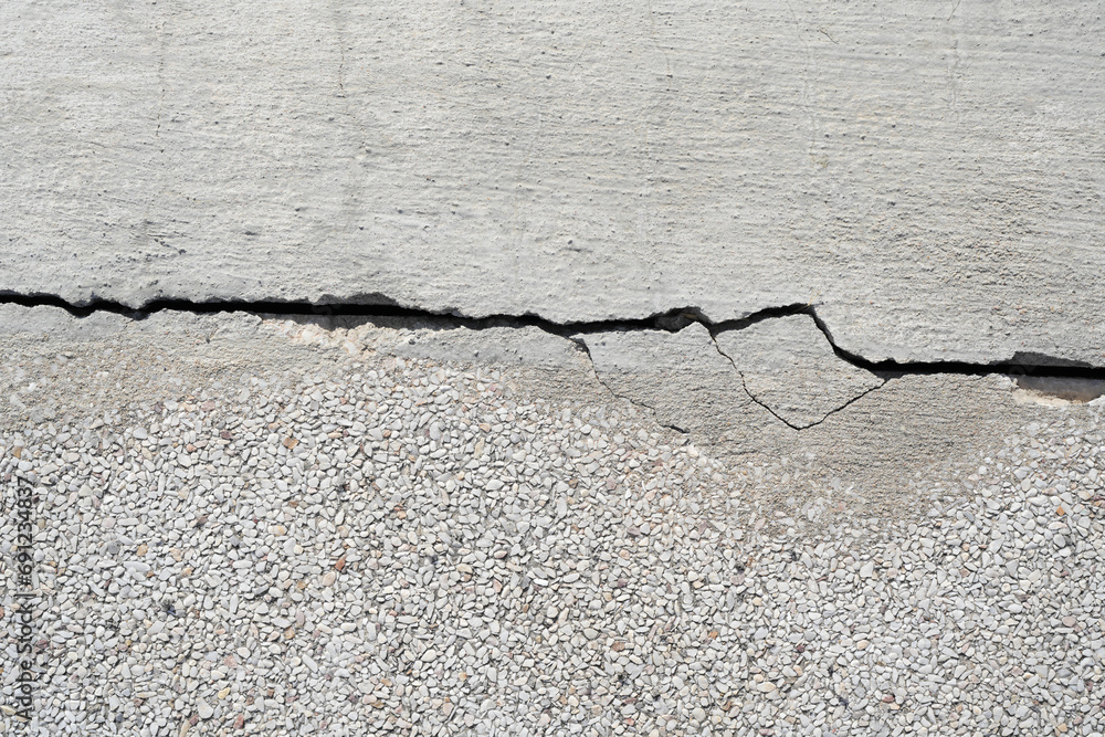 Obraz premium Cement cracks on the road surface