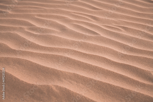 The background image of the sand texture created by the wind, erosion © Tatiana Kashko