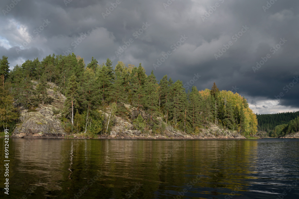 Lake Ladoga near the village Lumivaara on a sunny autumn day, Ladoga skerries, Lakhdenpokhya, Republic of Karelia, Russia Lake Ladoga near the village Lumivaara on a sunny autumn day, Ladoga skerries, Lakhdenpokhya, Republic of Karelia, Russia