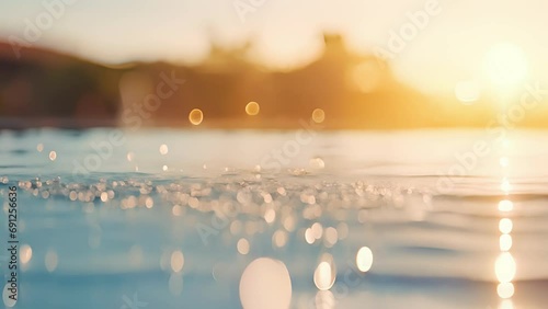 Tranquil closeup of water droplets on the infinity pool edge, capturing the tranquil ambiance of a sunset swim. photo