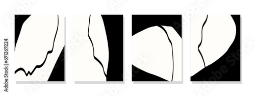 Modern minimalist wall decoration featuring abstract black and white shapes with brushed black lines.