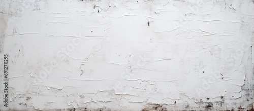 Weathered, wrinkled white wall with textured poster photo
