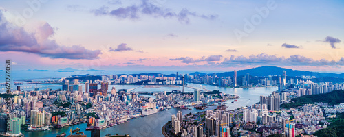 Aerial view of Zhuhai and Macau city skyline with modern buildings scenery at dusk, Guangdong Province, China. Famous travel destination. Panoramic view.