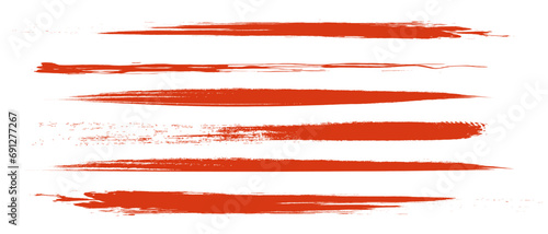 朱色のブラシストローク。毛筆タッチ。アナログ素材。