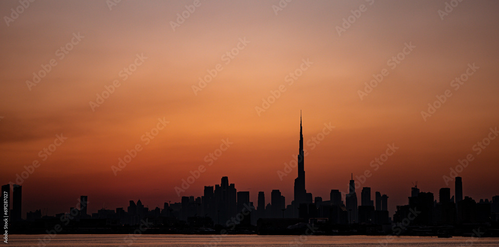  amazing  sunset Dubai skyline from a bay view 
