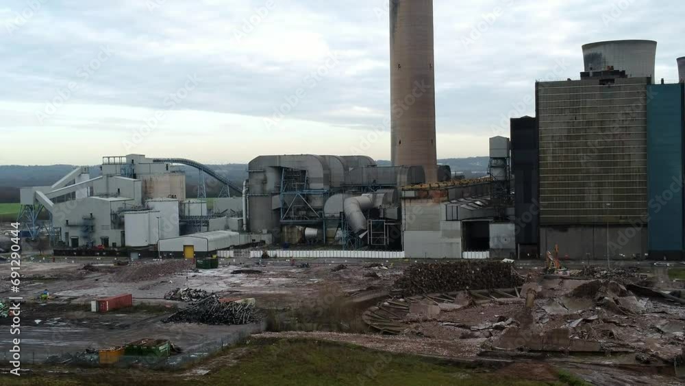 Fiddlers ferry power station aerial view wreckage of demolished cooling towers and disused factory remains, Zoom out shot Fiddlers ferry power station aerial view wreckage of demolished cooling towers and disused factory remains, Zoom out shot