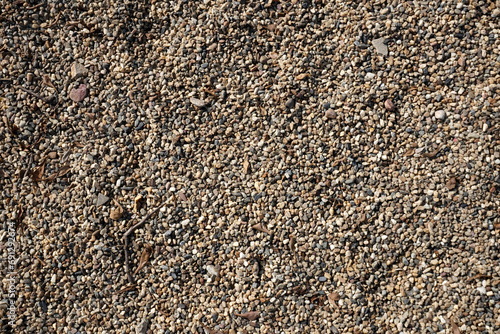 Close-up shot with gravel stones, pebbles as a background.