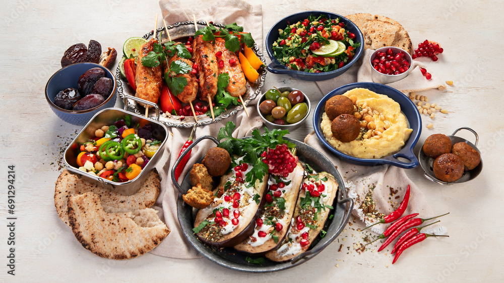 Middle eastern or Arabic dishes on light background. Tasty traditional food Middle eastern or Arabic dishes on light background. Tasty traditional food