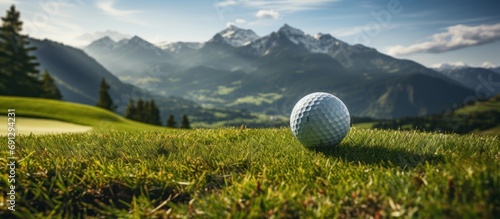 Golf ball on the background of the mountains