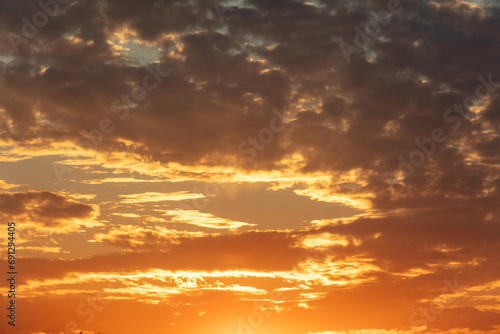 Fototapeta Naklejka Na Ścianę i Meble -  Golden sunset on the sky with clouds