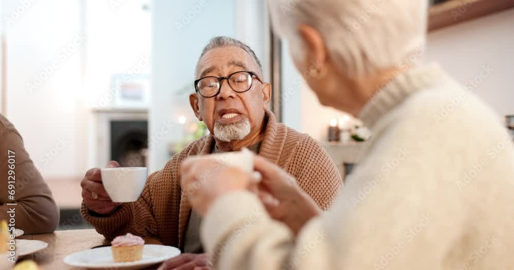 Tea party, friends and conversation with an old man in a retirement home together for bonding in the morning. Food, drink and a group of senior people talking in the living room of an apartment Tea party, friends and conversation with an old man in a retirement home together for bonding in the morning. Food, drink and a group of senior people talking in the living room of an apartment