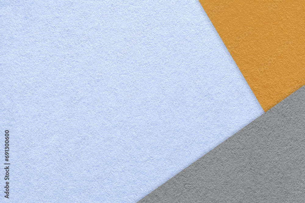 Texture of craft light blue color paper background with orange and gray border. Vintage abstract sky cardboard. Texture of craft light blue color paper background with orange and gray border. Vintage abstract sky cardboard.