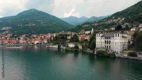 Drone view of Domaso, a small municipality in the province of Como in the Italian region of Lombardy, Italy. Featuring the infamous Palazzo Gallio situated right on the coast of Lake Como. photo