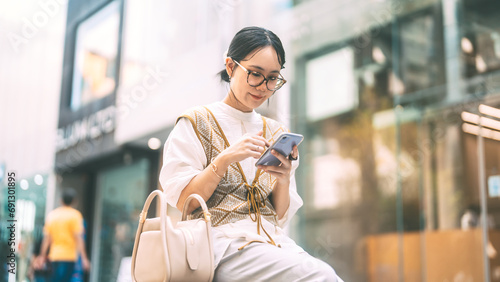 Photography Casual business asian woman using smartphone city lifestyles with modern technol