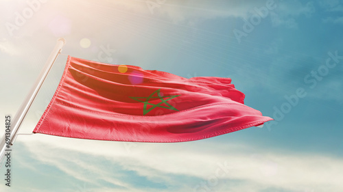 Morocco national flag cloth fabric waving on the sky - Image photo