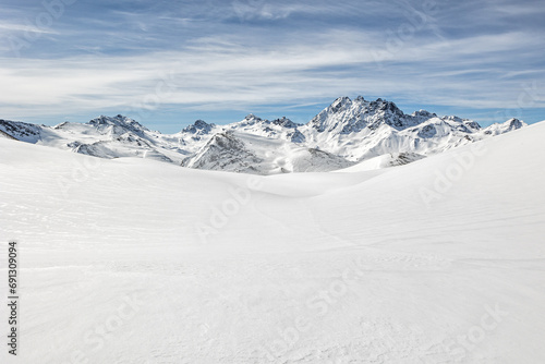 Snowy mountains in the Austrian Alps. Ski resort in winter.