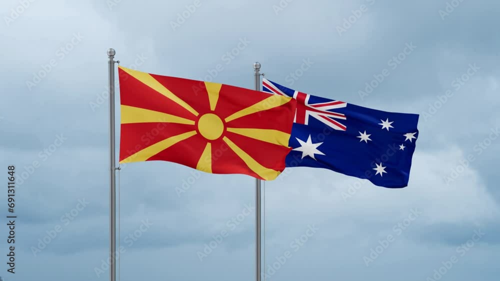 Australia flag and North Macedonia flag waving together on cloudy sky, endless seamless loop, two country relations concept Australia flag and North Macedonia flag waving together on cloudy sky, endless seamless loop, two country relations concept