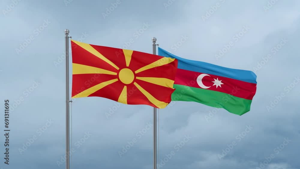 Azerbaijan and North Macedonia flag waving together on cloudy sky, endless seamless loop, two country cooperation concept Azerbaijan and North Macedonia flag waving together on cloudy sky, endless seamless loop, two country cooperation concept