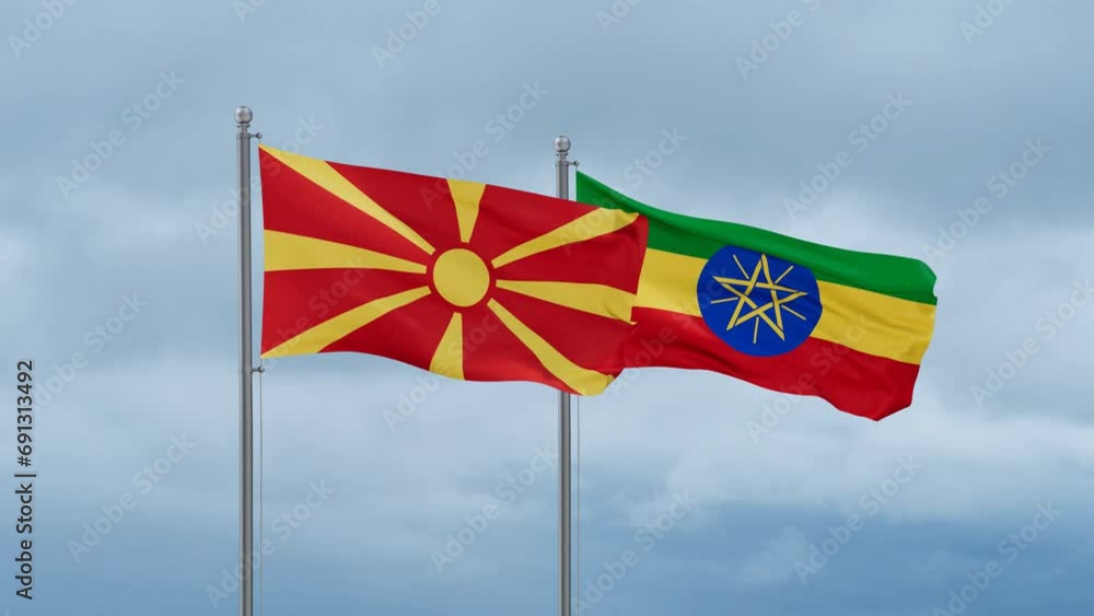 Ethiopia flag and North Macedonia flag waving together on cloudy sky, endless seamless loop, two country relations concept Ethiopia flag and North Macedonia flag waving together on cloudy sky, endless seamless loop, two country relations concept
