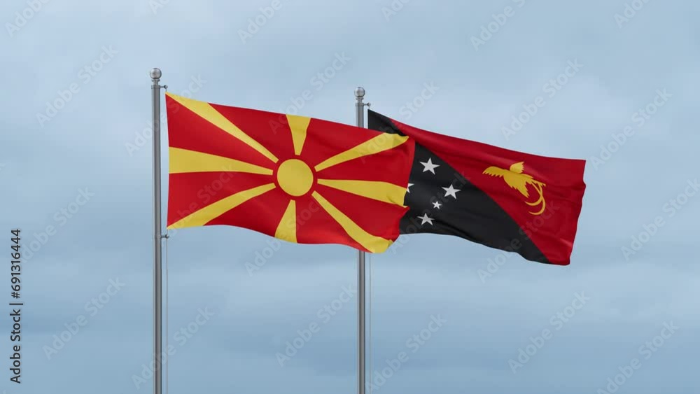Papua New Guinea flag and North Macedonia flag waving together on cloudy sky, endless seamless loop, two country relations concept Papua New Guinea flag and North Macedonia flag waving together on cloudy sky, endless seamless loop, two country relations concept