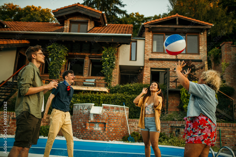 Multicultural group having a blast in the backyard, engaged in conversation and playful ball games Multicultural group having a blast in the backyard, engaged in conversation and playful ball games