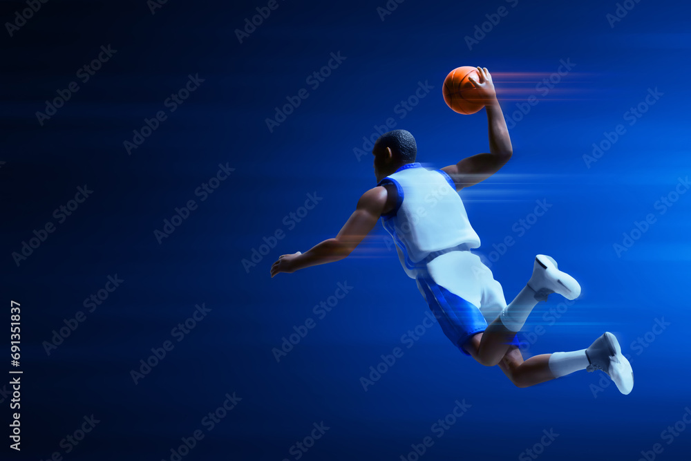 3d illustration young professional basketball player slam dunk on dark blue background