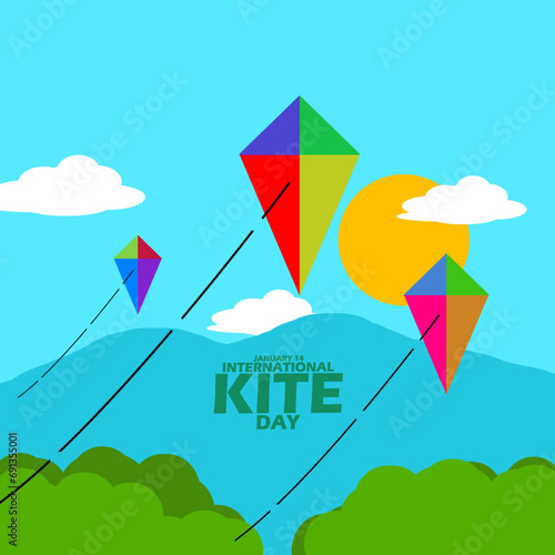 International Kite Day event banner. Several colorful kites flying above the sky with a view of the mountains, with bold text to celebrate on January 14