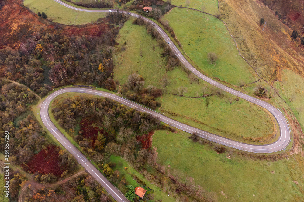 Aerial view of the road towards Alto del Caracol, in the Pasiegos valleys of Cantabria.