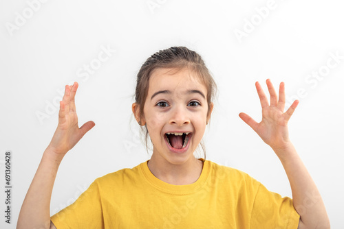 Happy little Caucasian girl smiling on white background isolated.