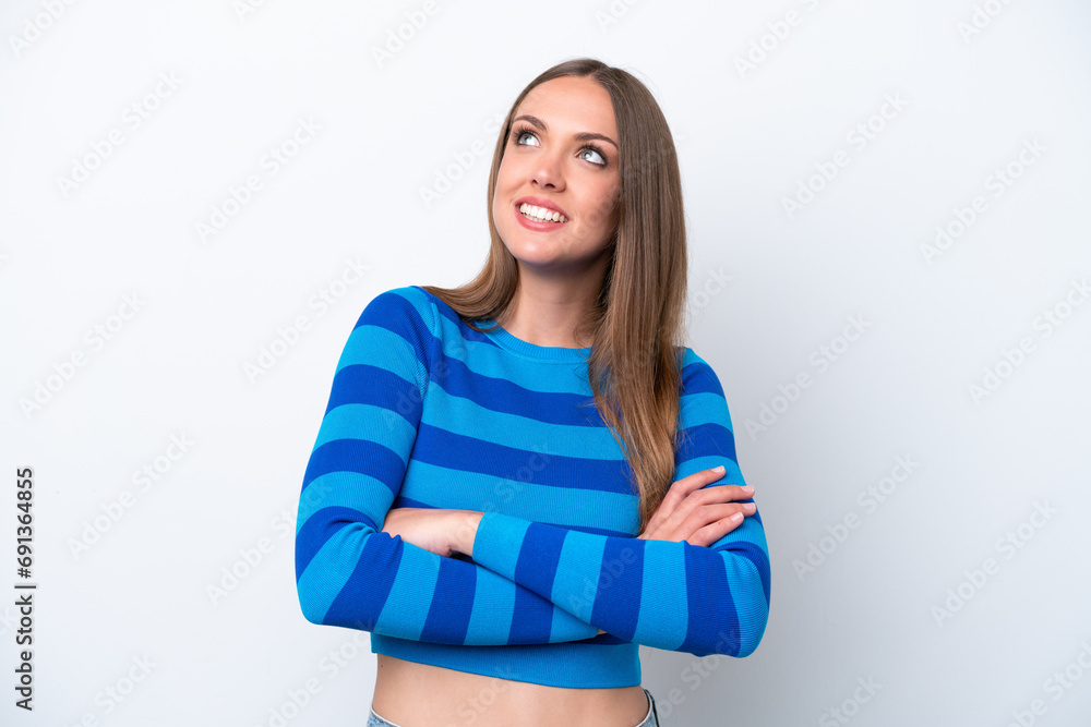 Young caucasian woman isolated on white background looking up while smiling Young caucasian woman isolated on white background looking up while smiling