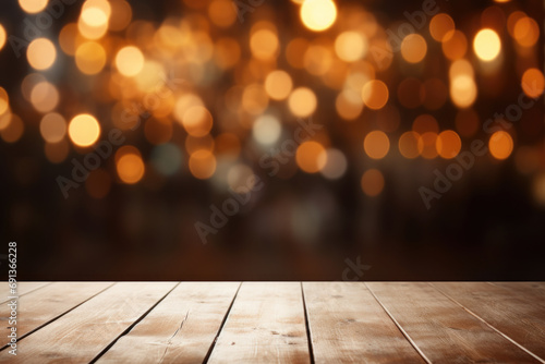 Wooden table with blurred lights in background.