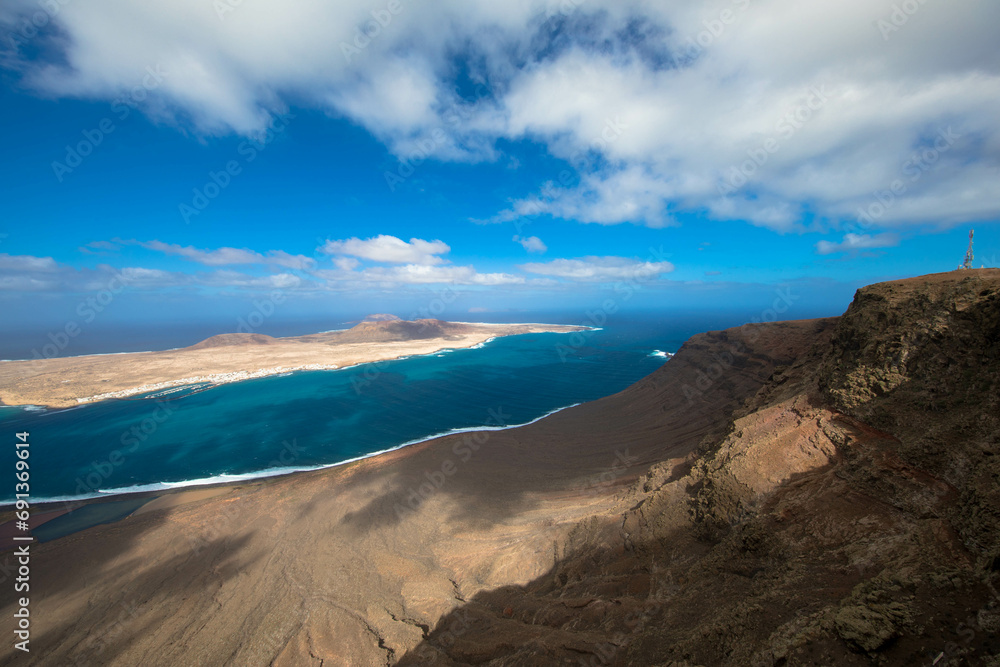 Spectacular Panorama view of the small island of La Graciosa. Seen from the Mirador del Rio on Lanzarote. 
Spain, Europe