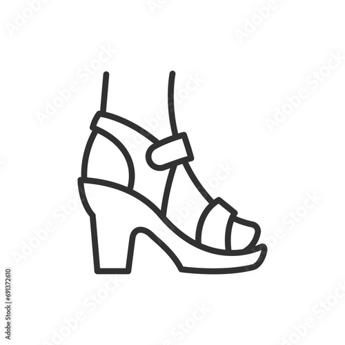 foot in women's strappy sandals, linear icon. Line with editable stroke