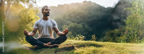 Masculine Meditation For Men. Latin-American Hispanic Man Meditating outdoors. Peaceful scene of man meditating on nature, moment of tranquility and mindfulness. photo