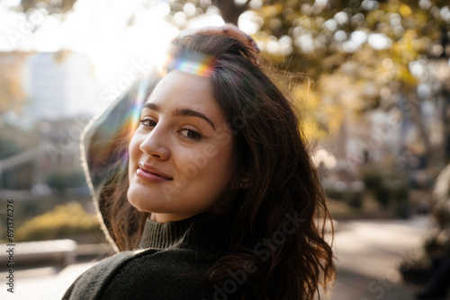Smiling beautiful woman on sunny day photo