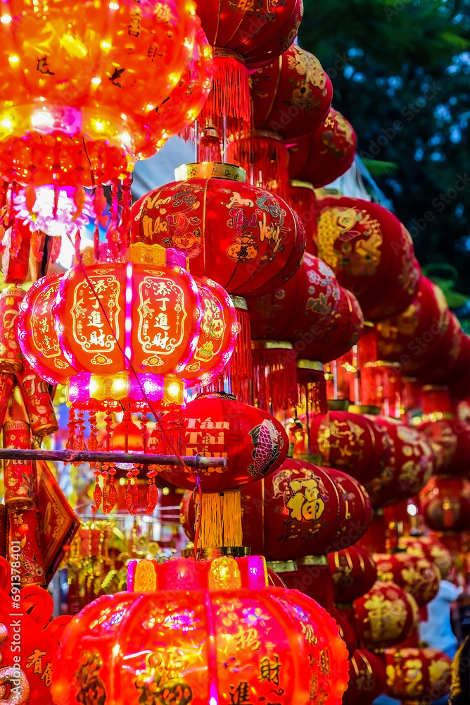 Many red lanterns with vietnamese language translated as 
