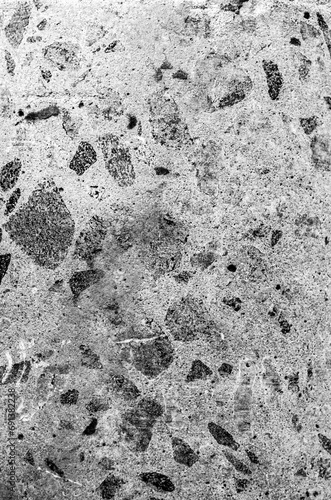Monochrome grunge texture. Texture background. Cement with stones.