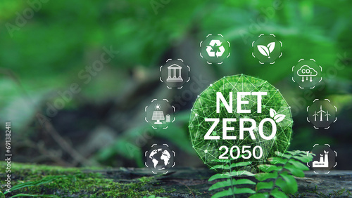 Net zero and carbon neutral concept. Net zero greenhouse gas emissions target. Climate neutral long term strategy. Close up earth on nature background. photo
