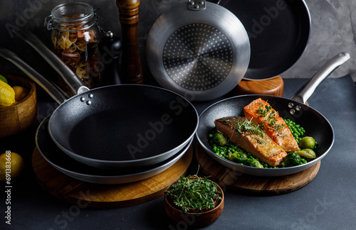 Steel frying pans in the kitchen