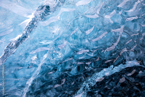 Abstract patterns in blue ice photo