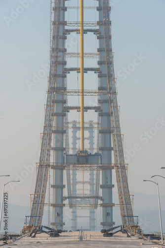 Osman Gazi Bridge (Izmit Bay Bridge). Izmit, Kocaeli, Turkey. Construction of a new road bridge continues across the Marmara Sea. photo