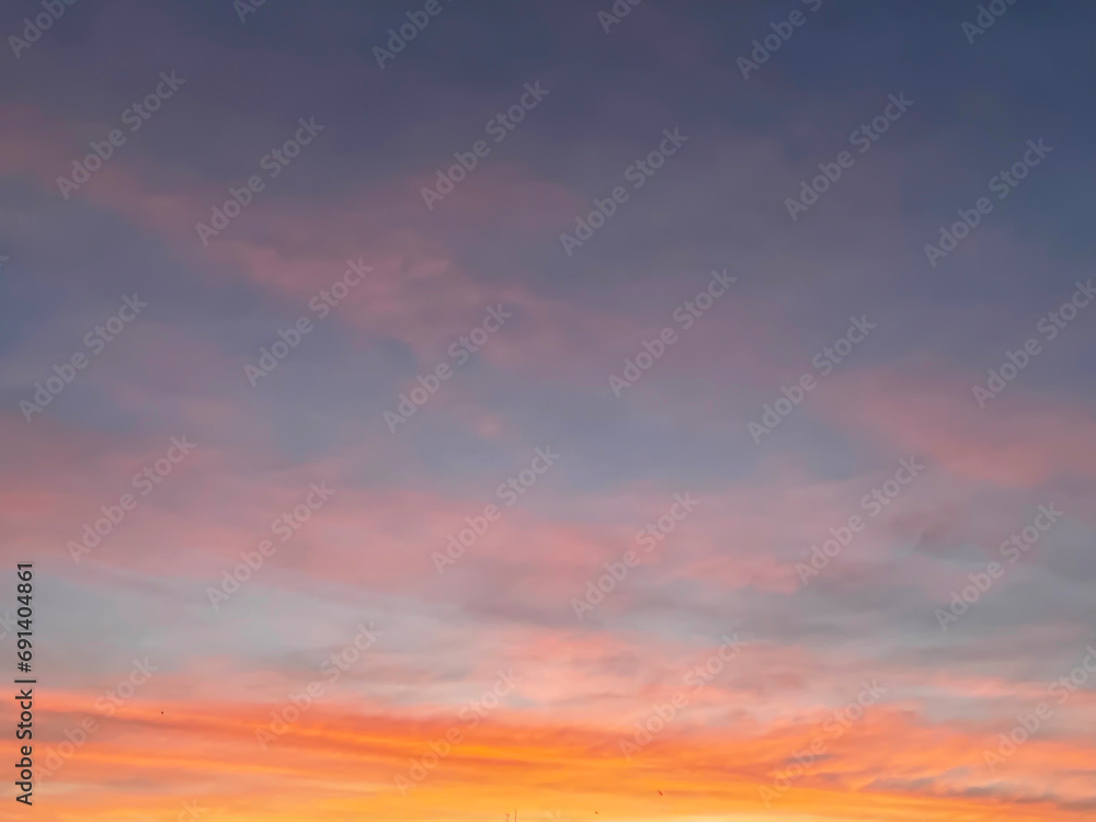 Sunset sky with colorful clouds background concept. Evening sunset. Twilight sky.