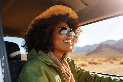 happy black woman traveling in car