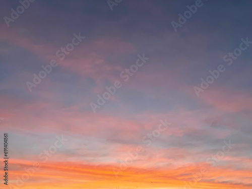 Sunset sky with colorful clouds background concept. Evening sunset. Twilight sky.