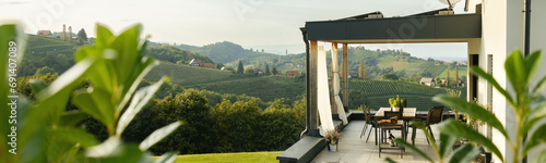The banner. The terrace of the house offers views of the hills and vineyards. Austria photo