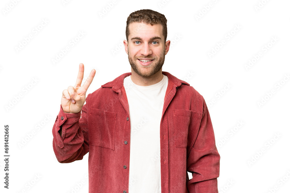 Young handsome blonde man over isolated chroma key background smiling and showing victory sign Young handsome blonde man over isolated chroma key background smiling and showing victory sign