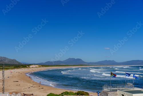 The beautiful Blue Flag Kleinmond beach with views towards Hermanus. Western Cape, South Africa photo