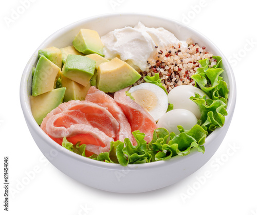 Salmon quinoa bowl with greens and vegetable. Balance in bowl. File contains clipping path.