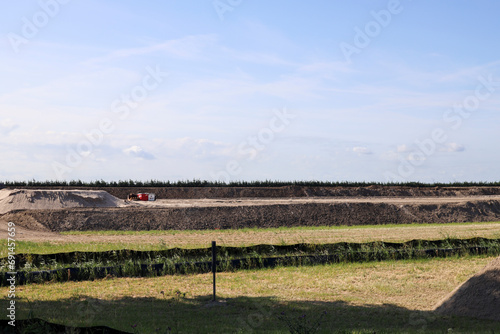 Pastures with farms and roads in the future Fifth Village of the Zuidplaspolder of the municipality of Zuidplas